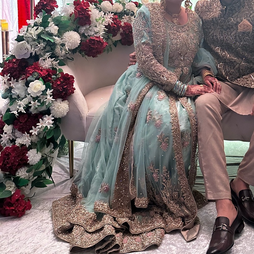Elegant Embroidered Outfit with Gold Accents